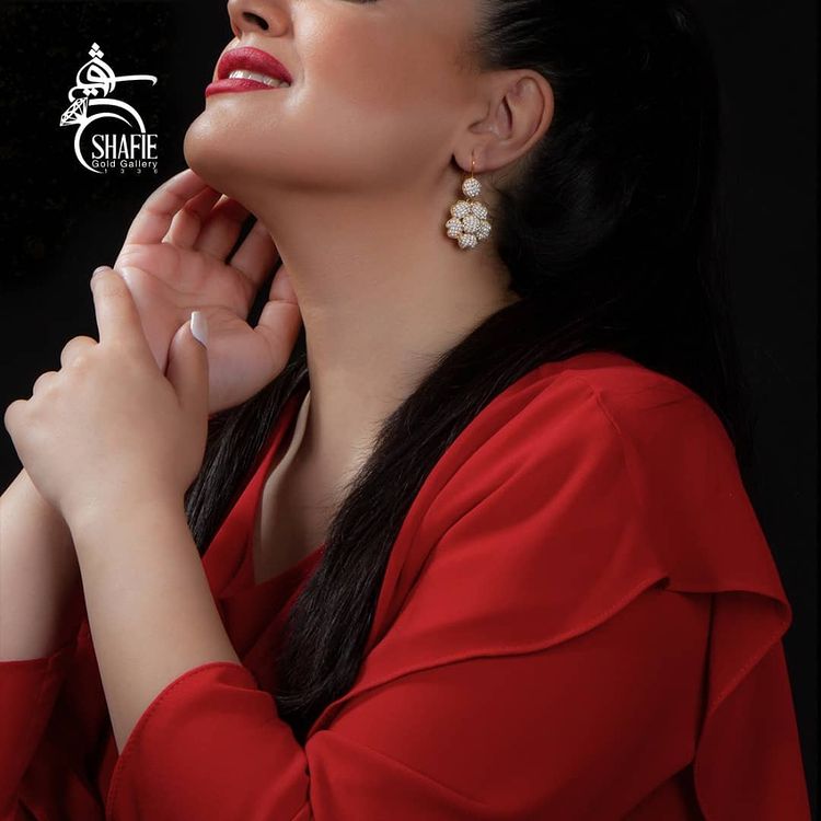 گوشواره مرواریدی طرح گل.jpg